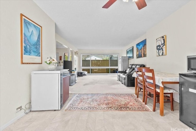 living room with ceiling fan