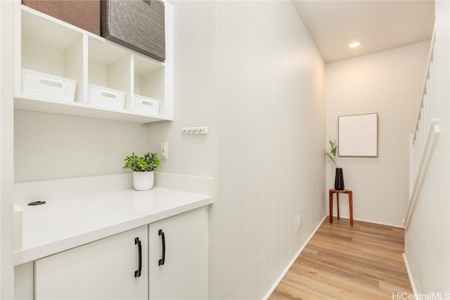 hallway featuring light hardwood / wood-style floors