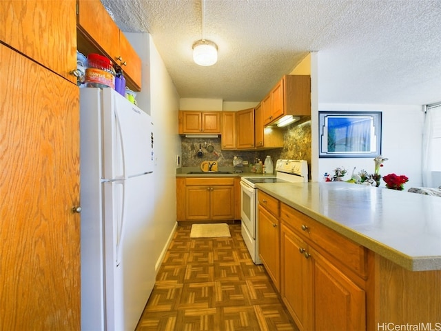 kitchen featuring a textured ceiling, decorative backsplash, dark parquet flooring, and white appliances