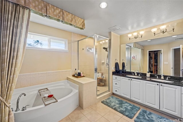 bathroom with vanity, separate shower and tub, and tile patterned floors