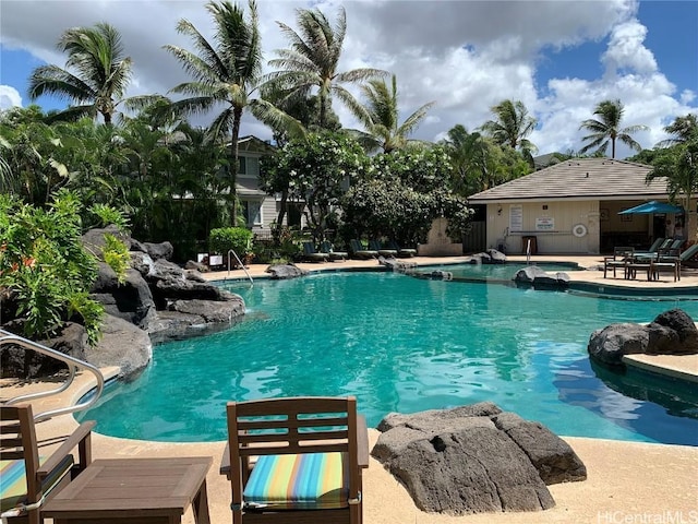 view of swimming pool featuring a patio