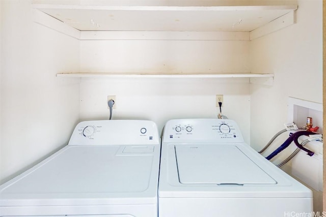 washroom with separate washer and dryer