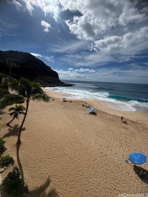 property view of water featuring a beach view