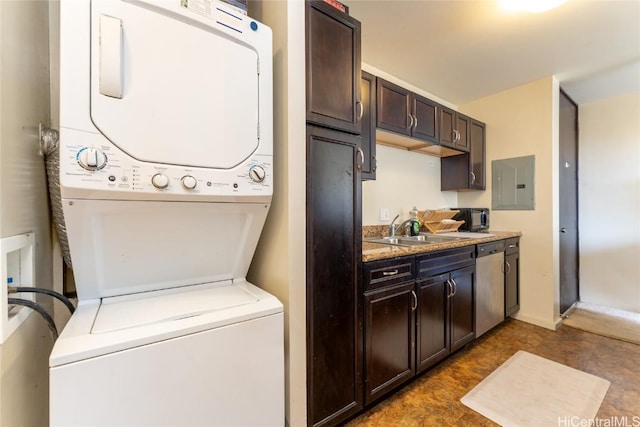 laundry room featuring sink, electric panel, and stacked washer and clothes dryer