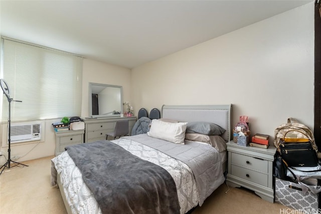 bedroom featuring cooling unit and light carpet