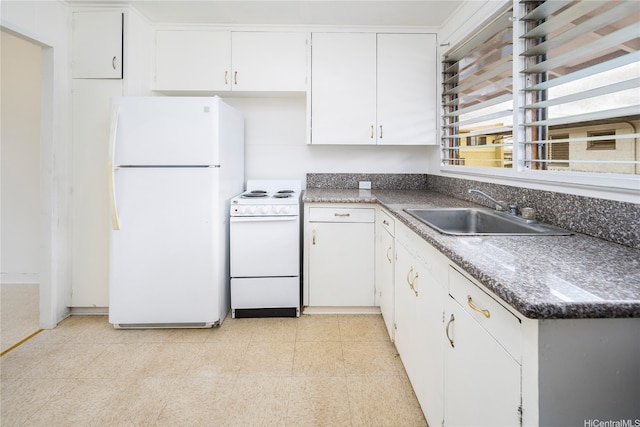 94-769 Haakoa Pl, Waipahu, HI 96797 - kitchen with white appliances, a sink, white cabinetry, light flooring, and dark countertops