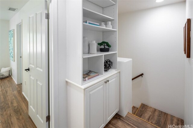 hallway featuring dark hardwood / wood-style floors