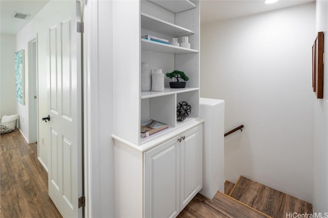 interior space featuring visible vents and wood finished floors