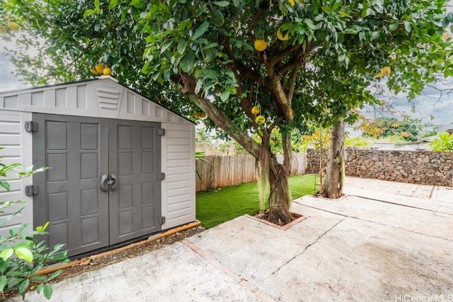 view of outbuilding with a lawn