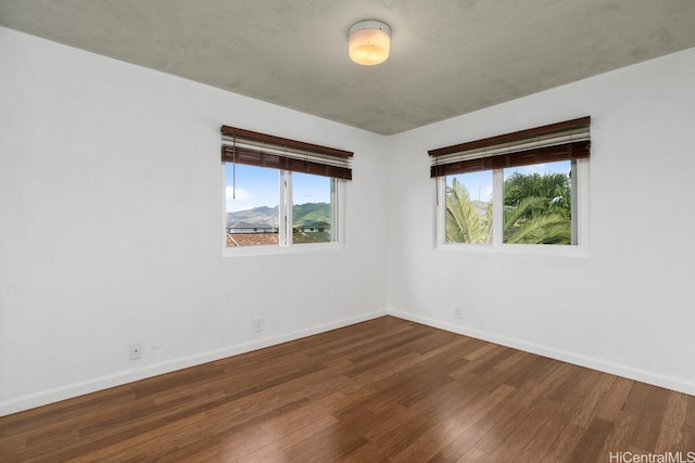 95-528 Awiki St, Mililani, HI 96789 - spare room featuring wood finished floors and baseboards