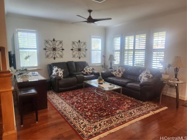 living room with plenty of natural light, hardwood / wood-style floors, and ceiling fan