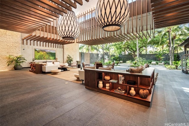 view of patio / terrace with an outdoor hangout area and a pergola