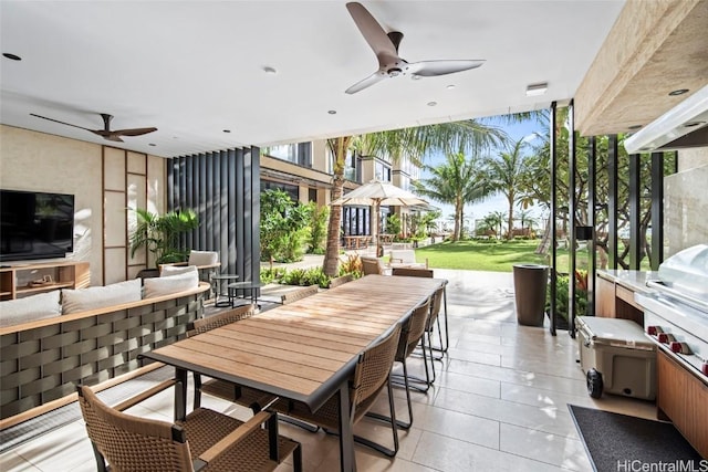 view of patio / terrace with ceiling fan and an outdoor living space