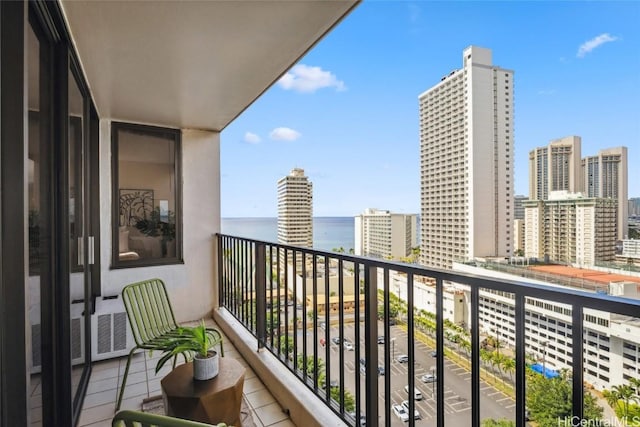 balcony featuring a water view