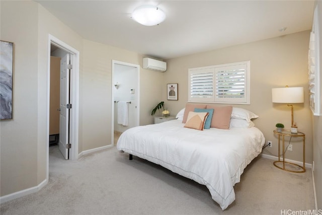 bedroom featuring a wall mounted AC and light carpet