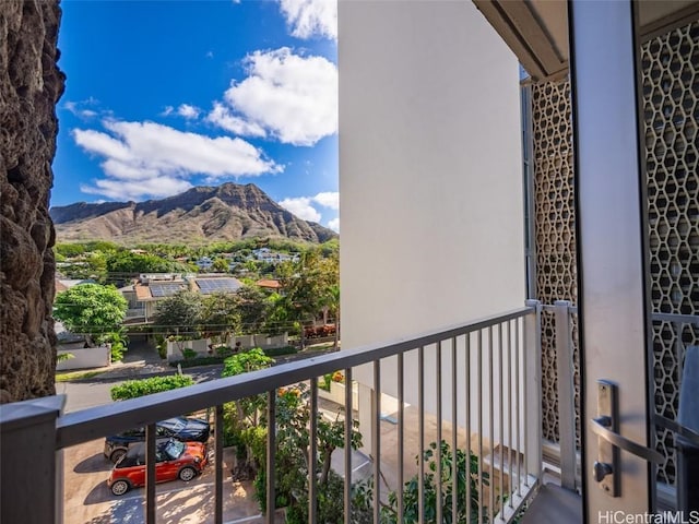 balcony featuring a mountain view