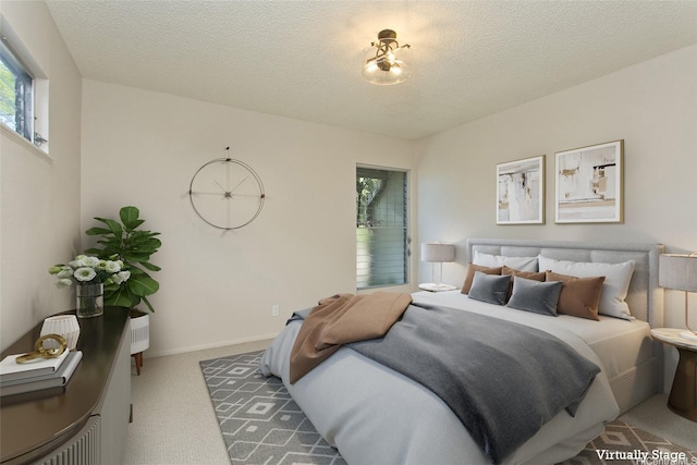 44-3026 Olina St Unit 7/6, Kaneohe, HI 96744 - bedroom with carpet floors and a textured ceiling