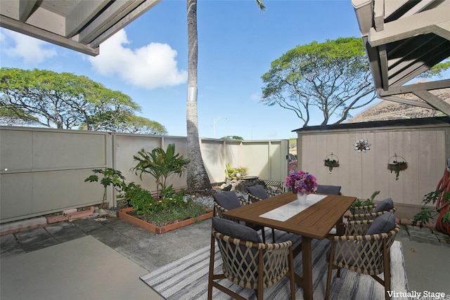 44-3026 Olina St Unit 7/6, Kaneohe, HI 96744 - fenced backyard with a patio area and outdoor dining space