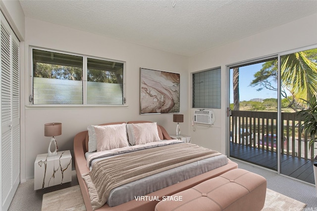 44-3026 Olina St Unit 7/6, Kaneohe, HI 96744 - carpeted bedroom featuring access to outside, cooling unit, multiple windows, and a textured ceiling