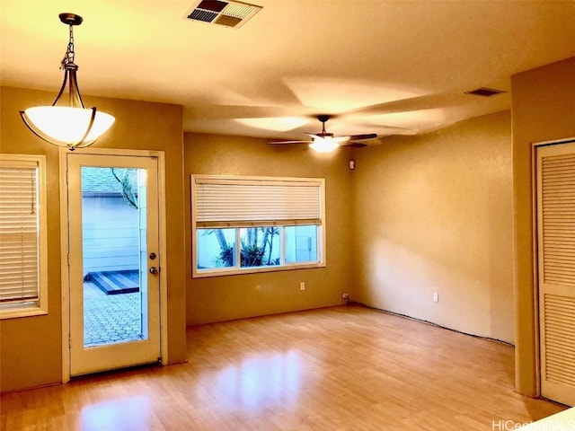 interior space featuring ceiling fan and light hardwood / wood-style flooring