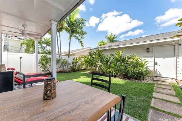 view of patio featuring ceiling fan