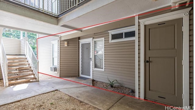 doorway to property featuring a patio area