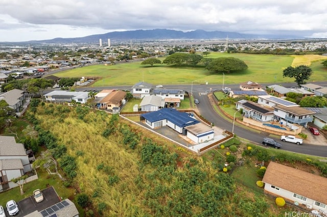 birds eye view of property featuring a mountain view