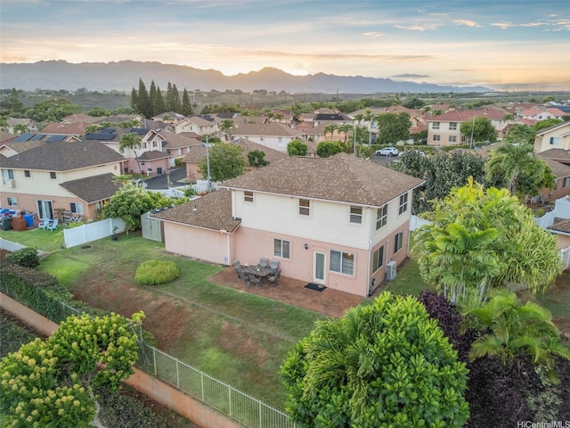 94-1092 Kikepa St Unit 179, Waipahu, HI 96797 - aerial view at dusk of a residential view and a mountain view