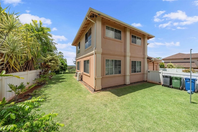 94-1092 Kikepa St Unit 179, Waipahu, HI 96797 - back of house with stucco siding