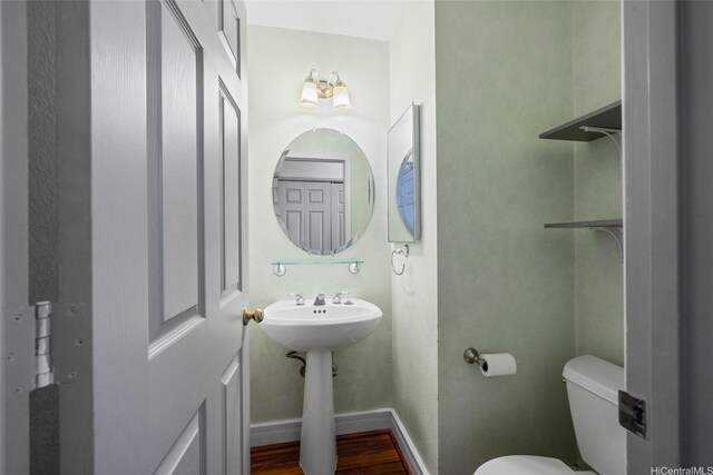 94-1092 Kikepa St Unit 179, Waipahu, HI 96797 - bathroom featuring toilet and wood finished floors