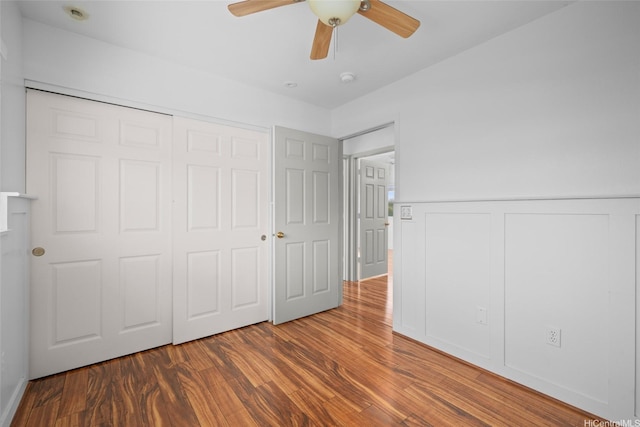 94-1092 Kikepa St Unit 179, Waipahu, HI 96797 - unfurnished bedroom with wood finished floors, a closet, and ceiling fan