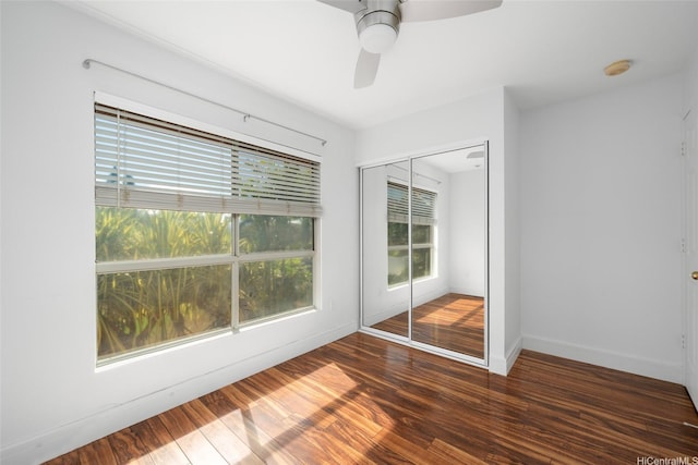 94-1092 Kikepa St Unit 179, Waipahu, HI 96797 - unfurnished bedroom featuring a closet, wood finished floors, and ceiling fan