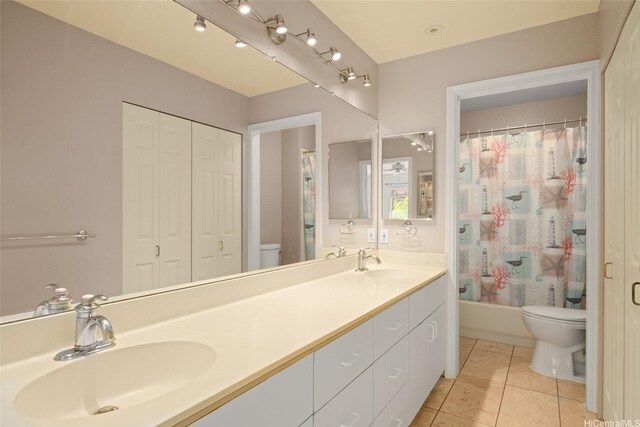 94-1092 Kikepa St Unit 179, Waipahu, HI 96797 - bathroom featuring double vanity, a closet, tile patterned flooring, and shower / bathtub combination with curtain