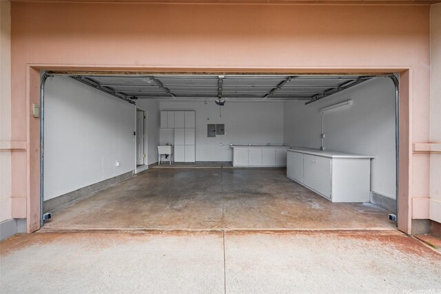 94-1092 Kikepa St Unit 179, Waipahu, HI 96797 - garage with electric panel and a sink