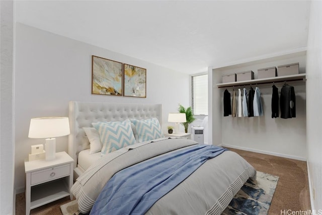 bedroom with dark carpet and a closet