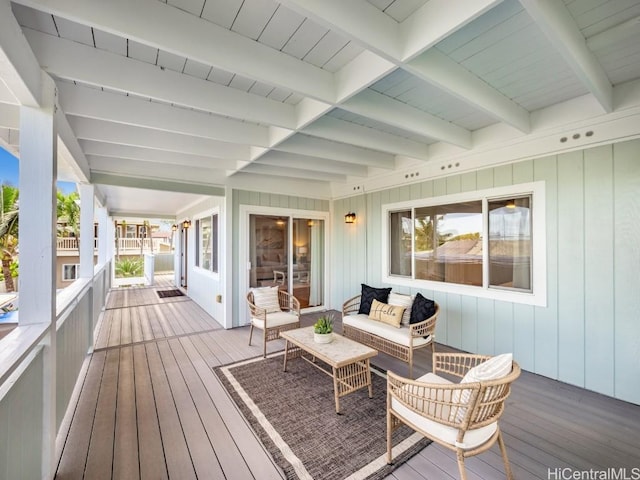 wooden terrace featuring outdoor lounge area