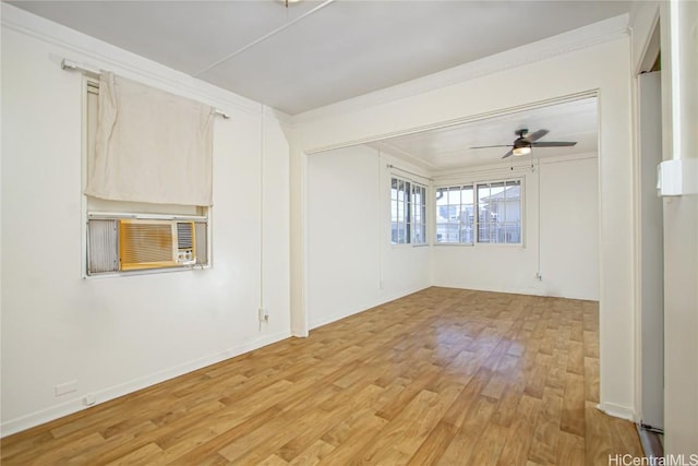 unfurnished room with ceiling fan, cooling unit, hardwood / wood-style floors, and crown molding