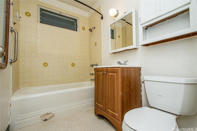 full bathroom with tiled shower / bath, tile patterned floors, vanity, and toilet