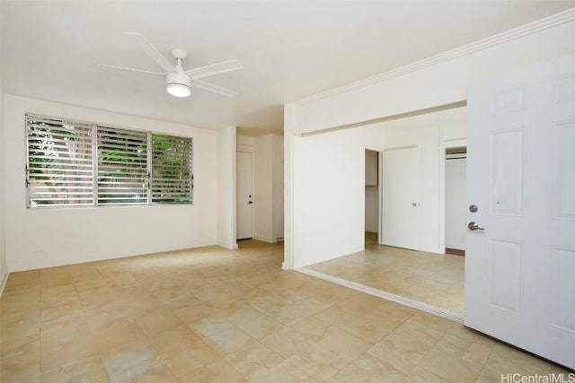 unfurnished room featuring ceiling fan