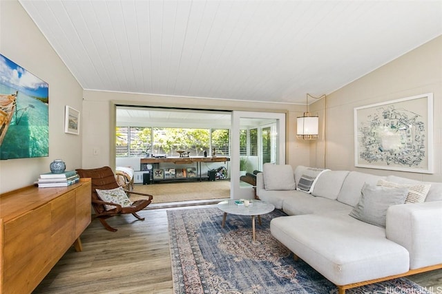 living room featuring lofted ceiling, wooden ceiling, and wood-type flooring