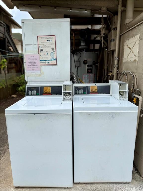 laundry area featuring washer and dryer and water heater