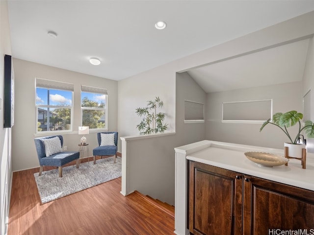 bathroom with hardwood / wood-style floors