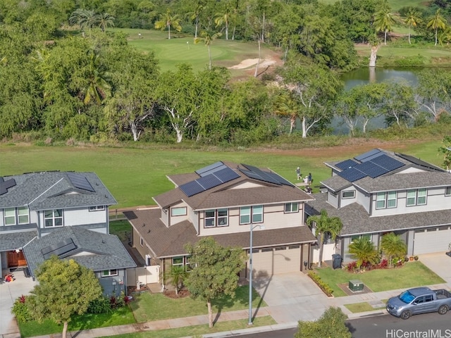 bird's eye view with a water view