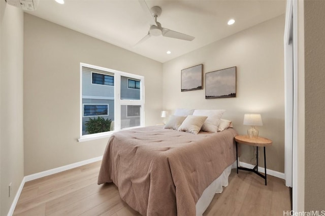 bedroom featuring ceiling fan and light wood-type flooring