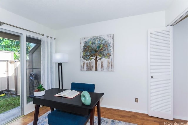 office space with hardwood / wood-style flooring