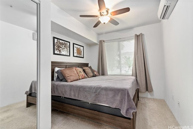 bedroom featuring a wall mounted air conditioner, light colored carpet, and ceiling fan