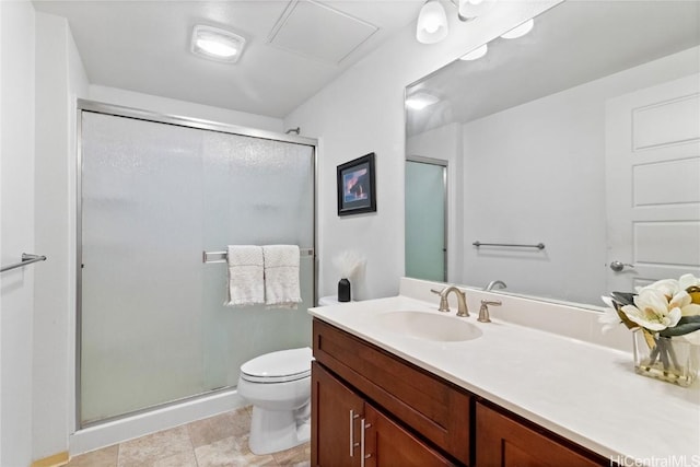 bathroom featuring an enclosed shower, vanity, and toilet