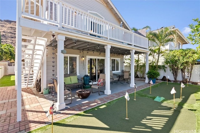 view of patio / terrace featuring a balcony and outdoor lounge area