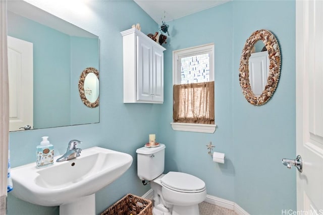 bathroom featuring sink and toilet