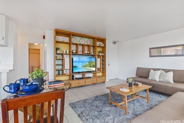 living room featuring light tile patterned flooring